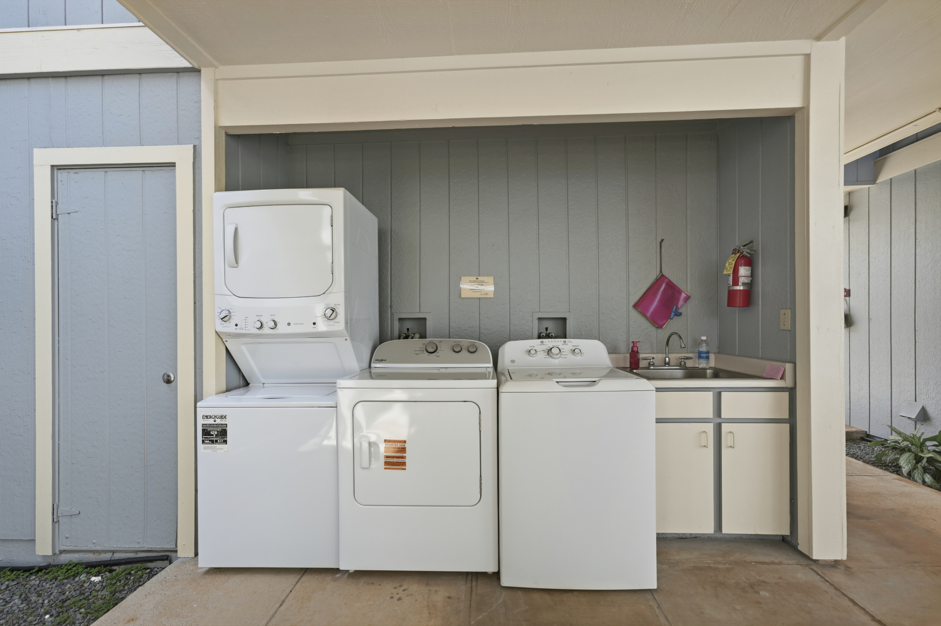 Community laundry area with washers and dryer
