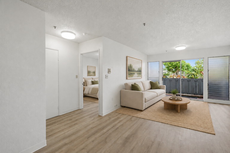 Entry hallway with bedroom and living room view