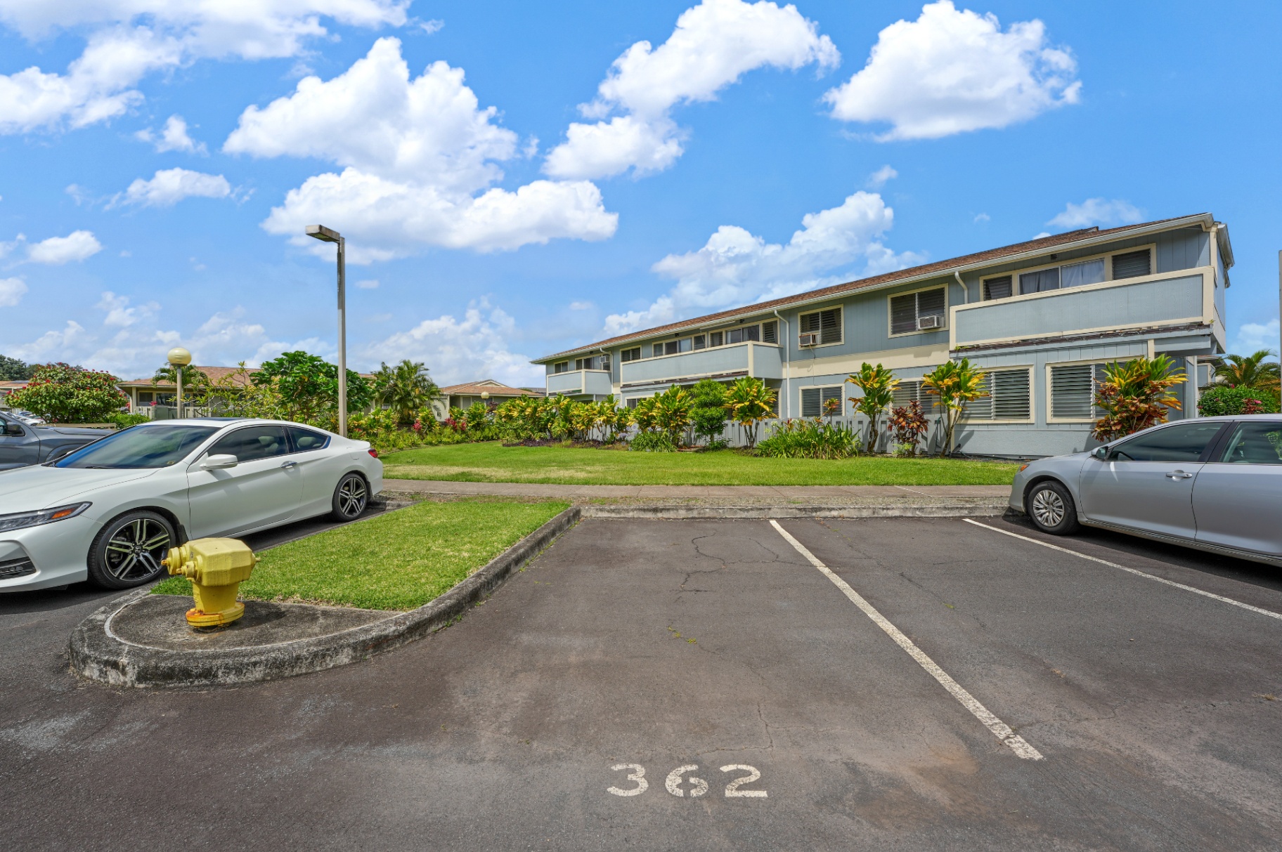 Assigned parking stall 362 with building exterior view